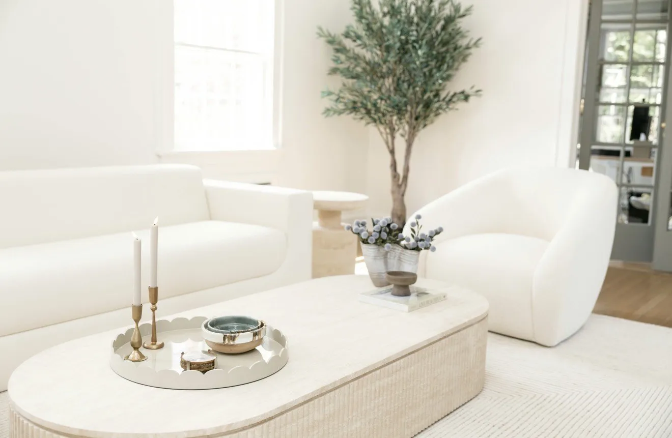 Bright Short Hills living room with sculptural white seating