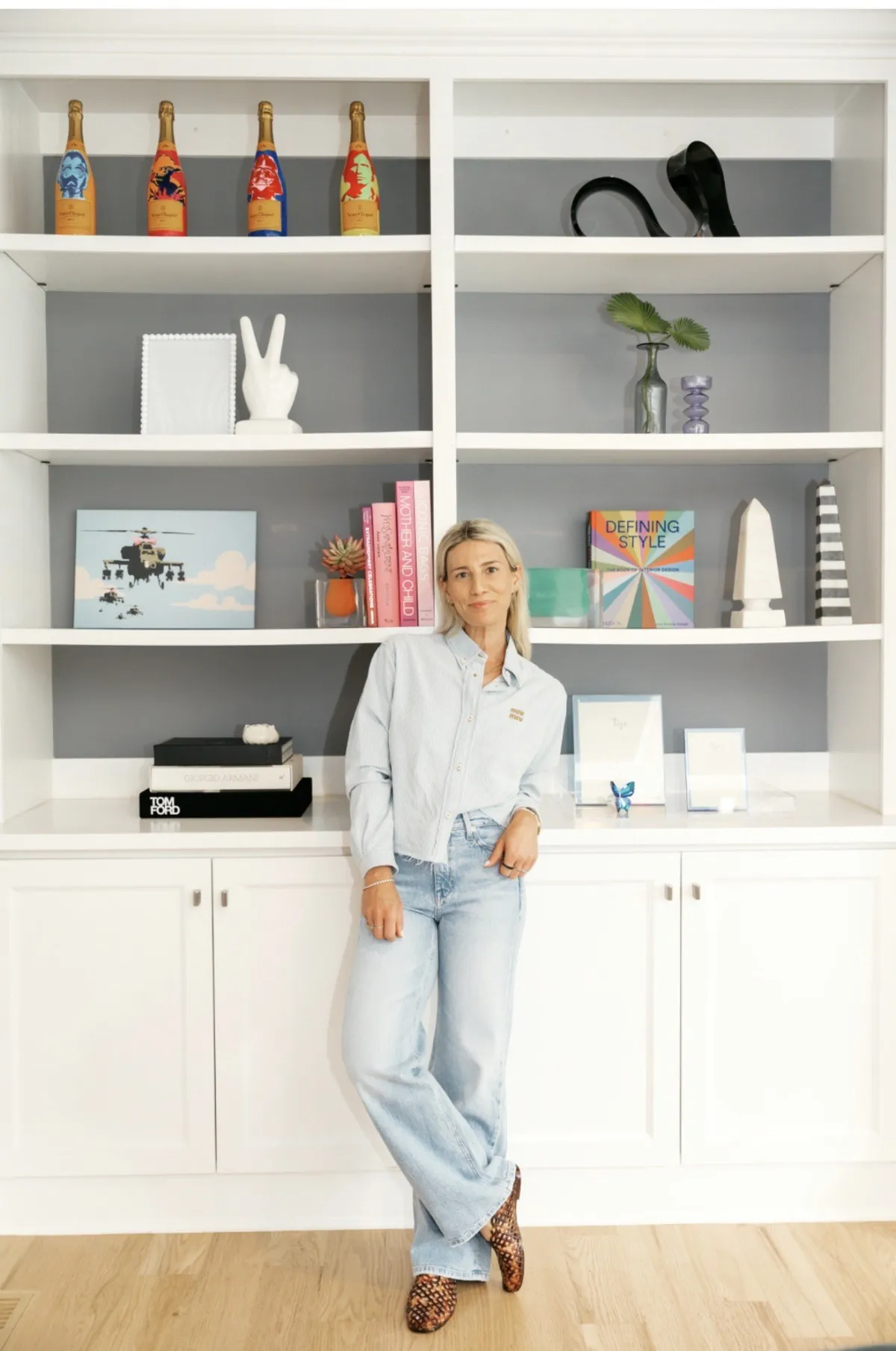 Marisa in front of the white built-ins she styled in Westfield